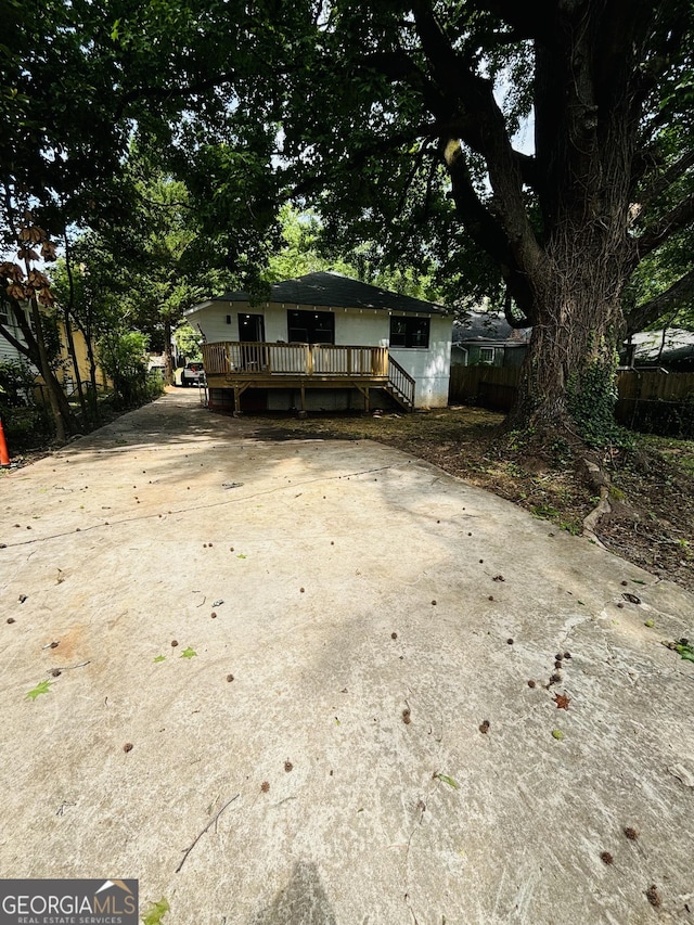 1460 Hartford Ave SW, Atlanta, GA 30310 - bungalow-style house with concrete driveway and a wooden deck