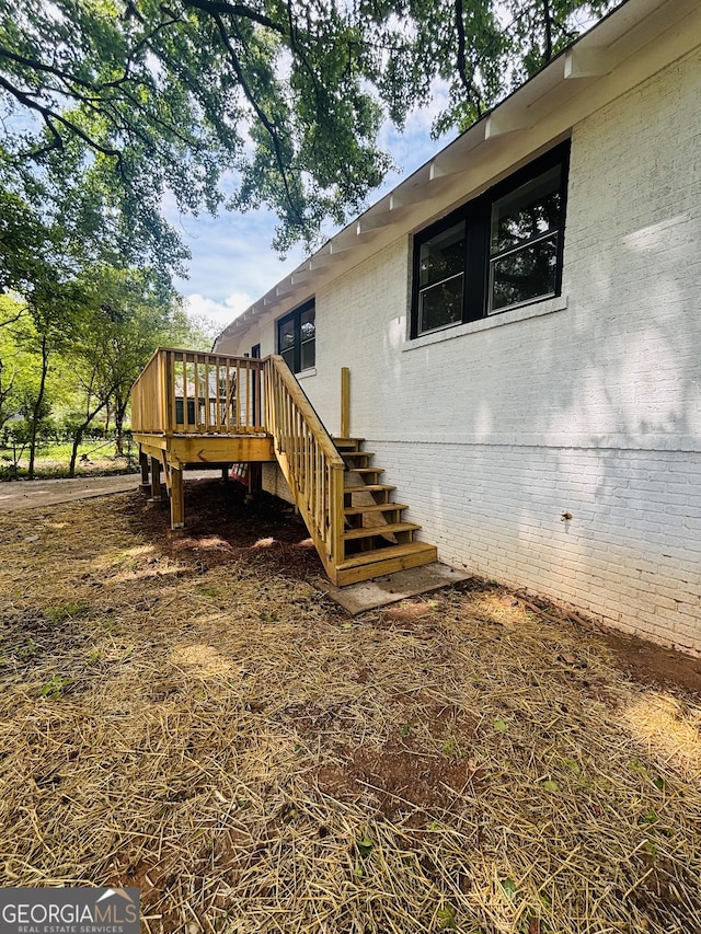 1460 Hartford Ave SW, Atlanta, GA 30310 - view of property exterior featuring a wooden deck and stairs