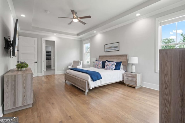 4445 Pebble Rock Dr, Cumming, GA 30041 - bedroom featuring a raised ceiling, light wood-type flooring, recessed lighting, and ceiling fan