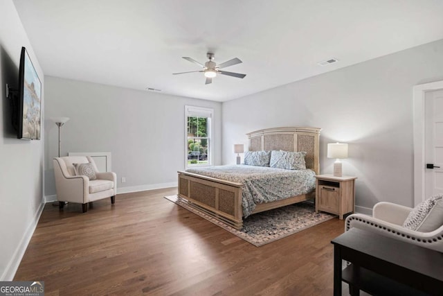 4445 Pebble Rock Dr, Cumming, GA 30041 - bedroom featuring dark wood-style floors and ceiling fan