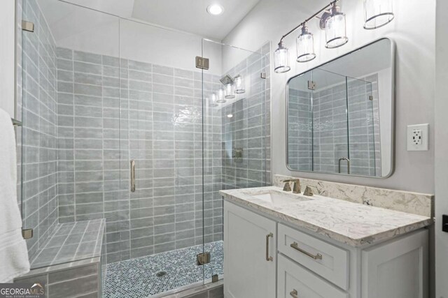 4445 Pebble Rock Dr, Cumming, GA 30041 - bathroom featuring vanity, a stall shower, and recessed lighting