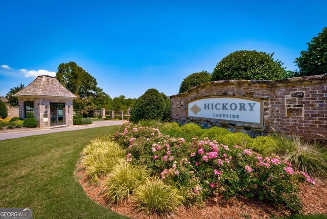 4445 Pebble Rock Dr, Cumming, GA 30041 - community sign with a lawn