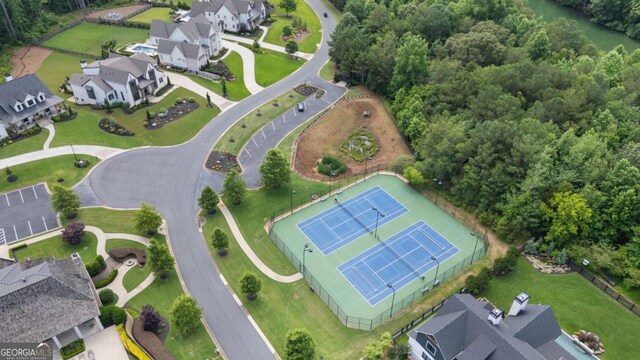 4445 Pebble Rock Dr, Cumming, GA 30041 - aerial view of property and surrounding area featuring nearby suburban area