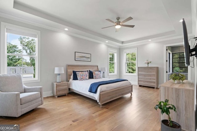 4445 Pebble Rock Dr, Cumming, GA 30041 - bedroom featuring a tray ceiling, light wood finished floors, ceiling fan, and recessed lighting