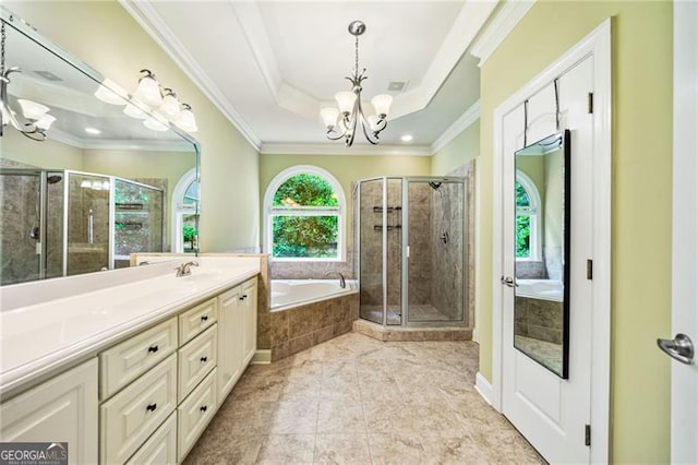 205 Camden Creek Ct, Lawrenceville, GA 30043 - bathroom featuring a chandelier, vanity, a bath, ornamental molding, and a shower stall