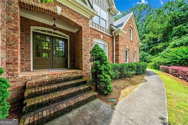 205 Camden Creek Ct, Lawrenceville, GA 30043 - property entrance featuring brick siding and french doors