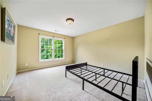 205 Camden Creek Ct, Lawrenceville, GA 30043 - unfurnished bedroom featuring baseboards and carpet floors