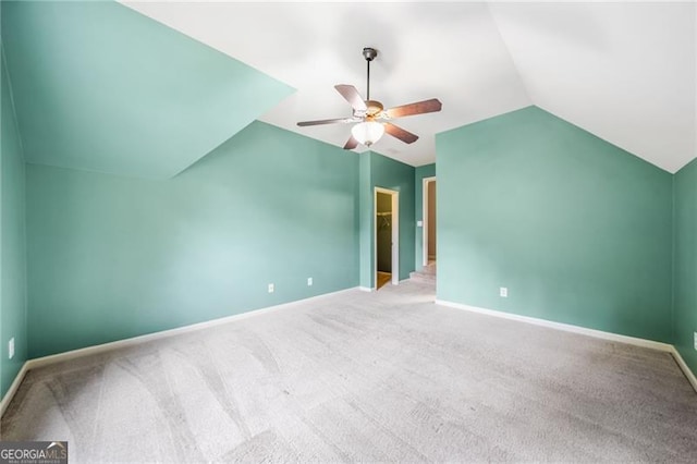 205 Camden Creek Ct, Lawrenceville, GA 30043 - bonus room with a ceiling fan, lofted ceiling, and carpet flooring