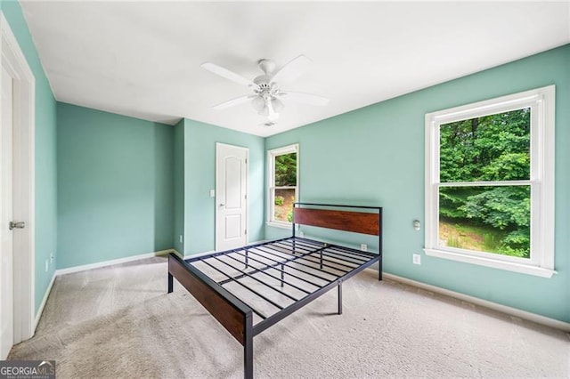 205 Camden Creek Ct, Lawrenceville, GA 30043 - bedroom with carpet and ceiling fan
