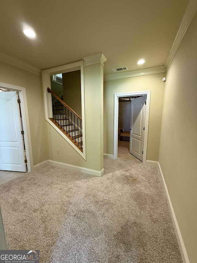 205 Camden Creek Ct, Lawrenceville, GA 30043 - carpeted empty room featuring crown molding, stairway, and recessed lighting
