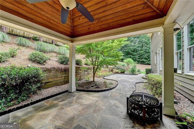 205 Camden Creek Ct, Lawrenceville, GA 30043 - view of patio featuring ceiling fan and a fire pit