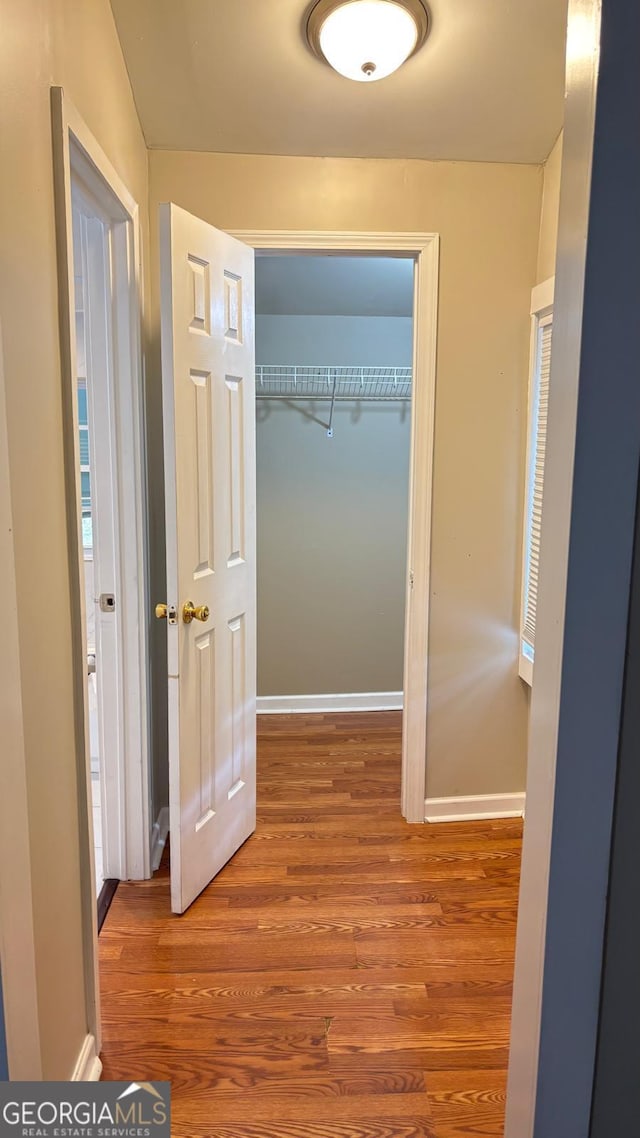 6197 Union Grove Rd, Lithia Springs, GA 30122 - corridor featuring wood finished floors and baseboards