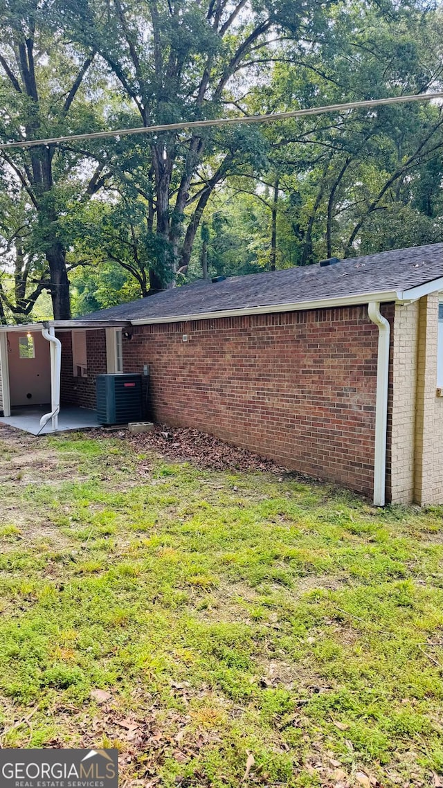 6197 Union Grove Rd, Lithia Springs, GA 30122 - view of grassy yard with a patio area