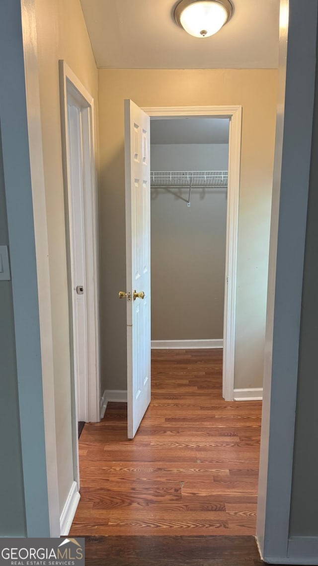 6197 Union Grove Rd, Lithia Springs, GA 30122 - corridor featuring wood finished floors and baseboards