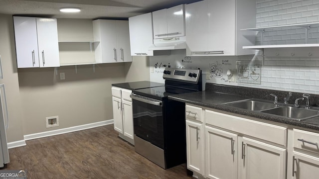 6197 Union Grove Rd, Lithia Springs, GA 30122 - kitchen featuring stainless steel range with electric cooktop, open shelves, under cabinet range hood, dark wood-style floors, and dark countertops
