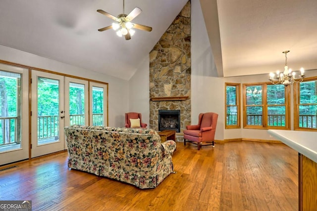 215 Souther Meadow Dr, Blairsville, GA 30512 - living room with wood finished floors, a chandelier, healthy amount of natural light, and high vaulted ceiling