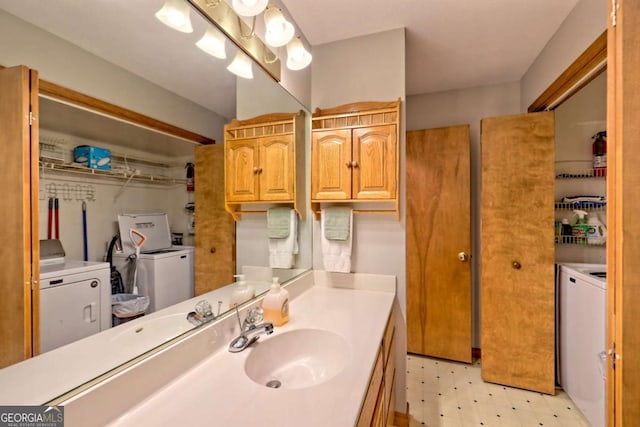215 Souther Meadow Dr, Blairsville, GA 30512 - bathroom with separate washer and dryer, tile patterned floors, and vanity