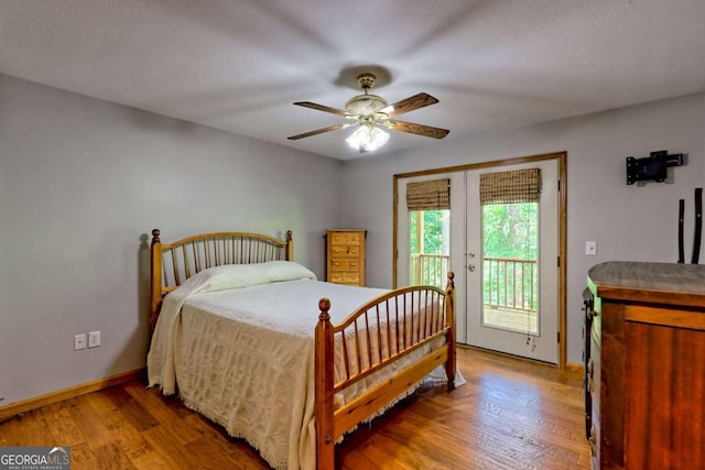 215 Souther Meadow Dr, Blairsville, GA 30512 - bedroom with access to outside, wood finished floors, and a ceiling fan