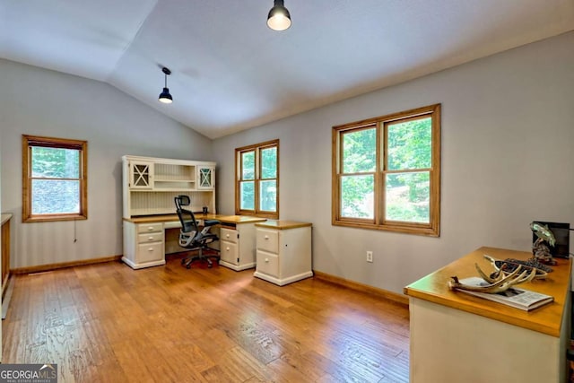 215 Souther Meadow Dr, Blairsville, GA 30512 - office area featuring light wood-style floors, vaulted ceiling, and built in study area