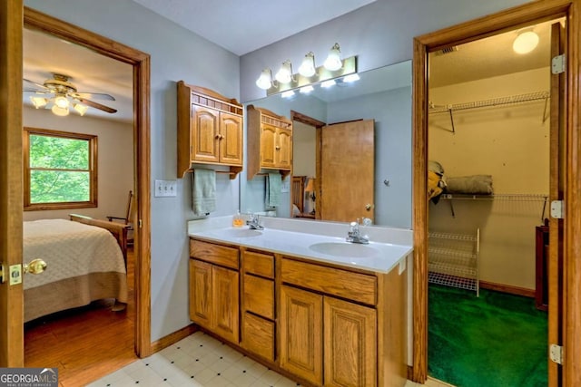 215 Souther Meadow Dr, Blairsville, GA 30512 - ensuite bathroom featuring double vanity, ceiling fan, and tile patterned floors