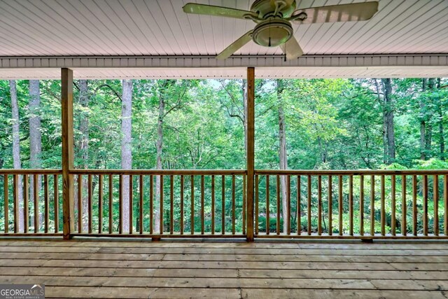 215 Souther Meadow Dr, Blairsville, GA 30512 - wooden terrace with ceiling fan and a view of trees