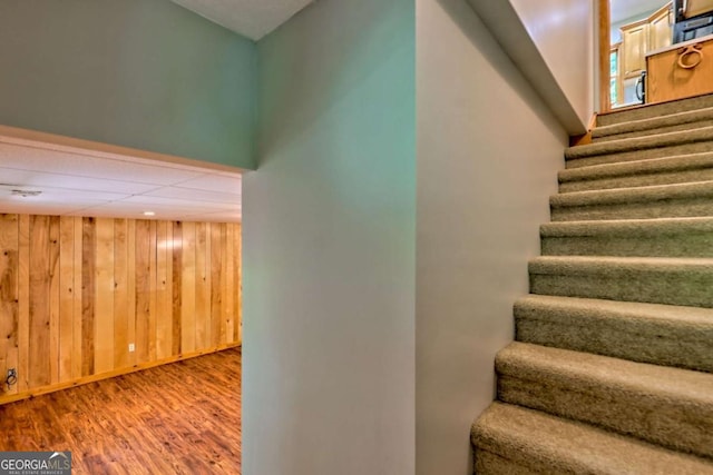 215 Souther Meadow Dr, Blairsville, GA 30512 - staircase with wood walls and wood finished floors