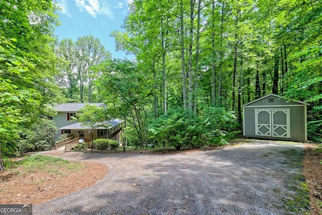 215 Souther Meadow Dr, Blairsville, GA 30512 - view of yard with a storage unit