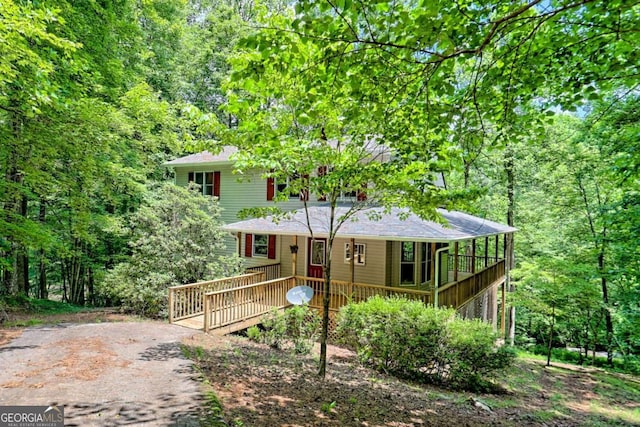 215 Souther Meadow Dr, Blairsville, GA 30512 - view of front facade with a porch and a wooded view