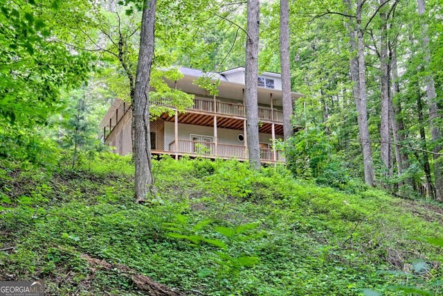 215 Souther Meadow Dr, Blairsville, GA 30512 - rear view of house featuring a forest view and a deck