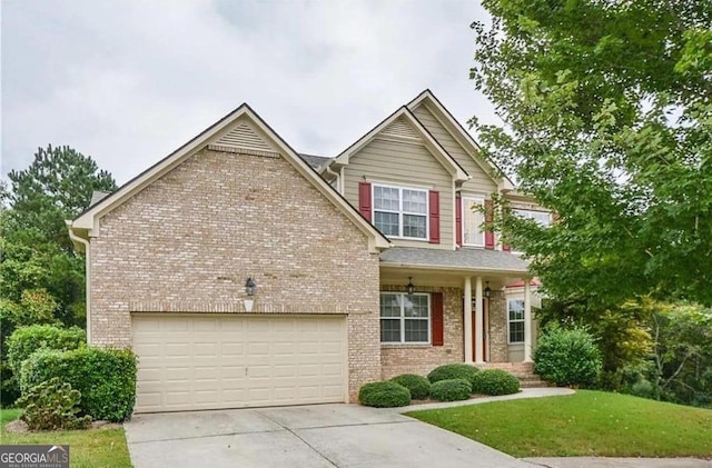 3439 Tupelo Trl, Auburn, GA 30011 - view of front of property with brick siding, a garage, driveway, and a front lawn