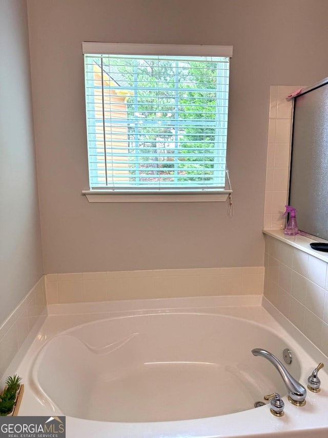 3439 Tupelo Trl, Auburn, GA 30011 - full bath featuring healthy amount of natural light and a garden tub