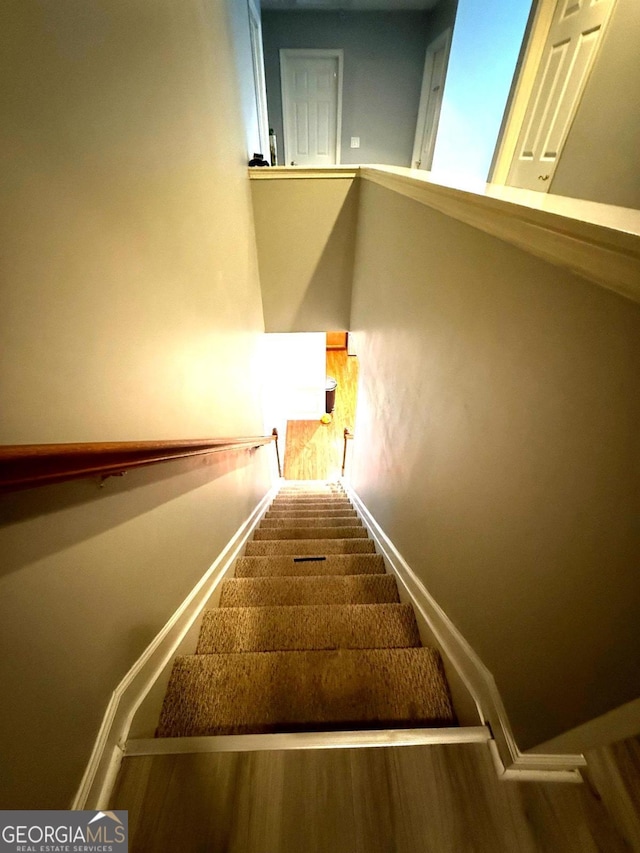 3439 Tupelo Trl, Auburn, GA 30011 - stairway with baseboards