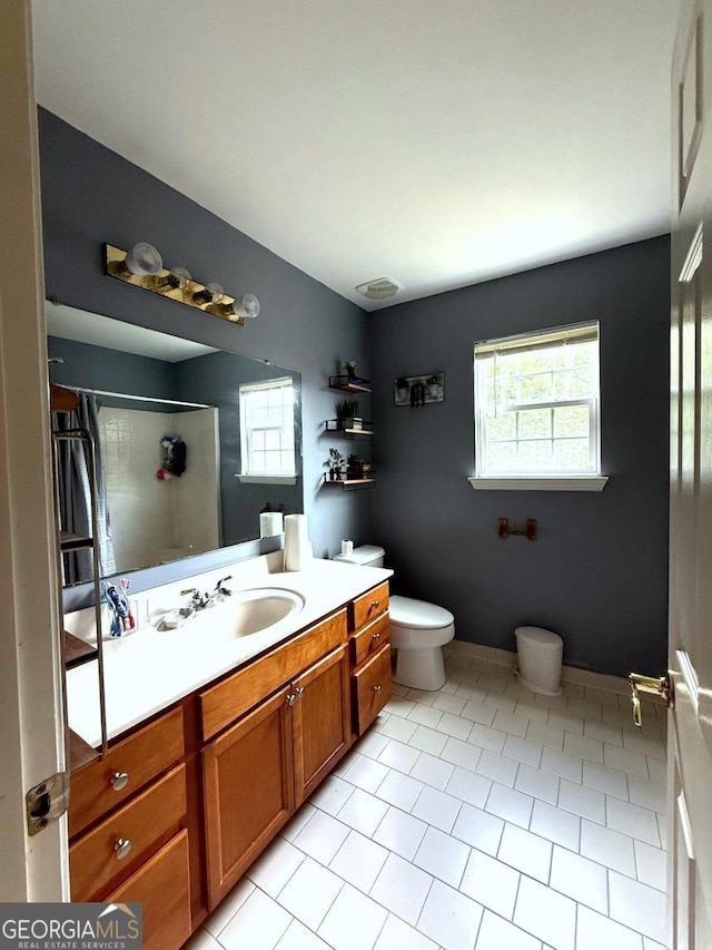 3439 Tupelo Trl, Auburn, GA 30011 - bathroom featuring vanity, a shower, and tile patterned floors