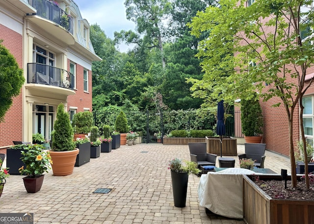 560 Dutch Valley Rd NE Unit 2412, Atlanta, GA 30324 - view of patio with an outdoor hangout area