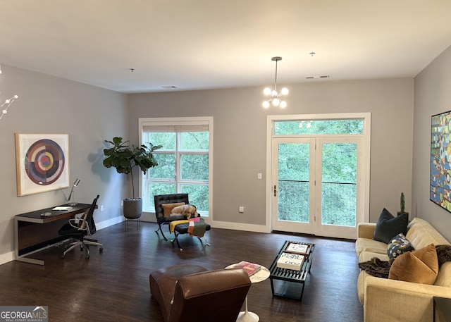560 Dutch Valley Rd NE Unit 2412, Atlanta, GA 30324 - living room with dark wood-style flooring, a chandelier, and an office area