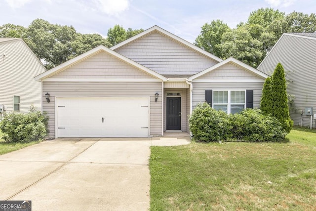 208 Flowing Meadows Dr, Kathleen, GA 31047 - view of front of home with a front lawn, concrete driveway, and a garage