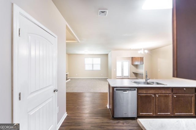208 Flowing Meadows Dr, Kathleen, GA 31047 - kitchen featuring dishwasher, light countertops, dark wood-type flooring, and open floor plan