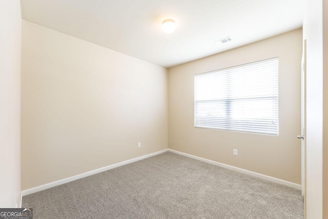 208 Flowing Meadows Dr, Kathleen, GA 31047 - carpeted empty room featuring baseboards