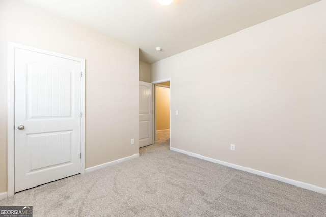 208 Flowing Meadows Dr, Kathleen, GA 31047 - unfurnished bedroom featuring light colored carpet and baseboards
