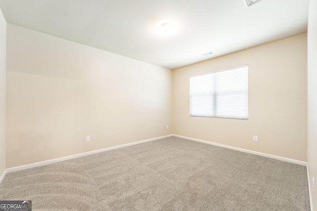 208 Flowing Meadows Dr, Kathleen, GA 31047 - empty room with carpet floors and baseboards