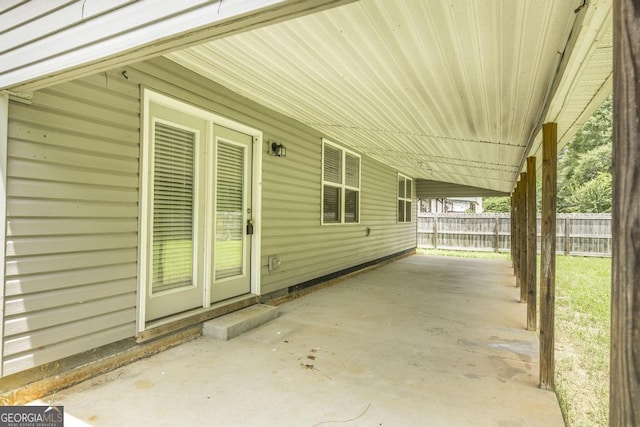 208 Flowing Meadows Dr, Kathleen, GA 31047 - view of patio / terrace with an attached carport
