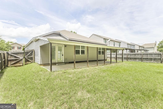 208 Flowing Meadows Dr, Kathleen, GA 31047 - rear view of property featuring a patio area, a fenced backyard, and a gate