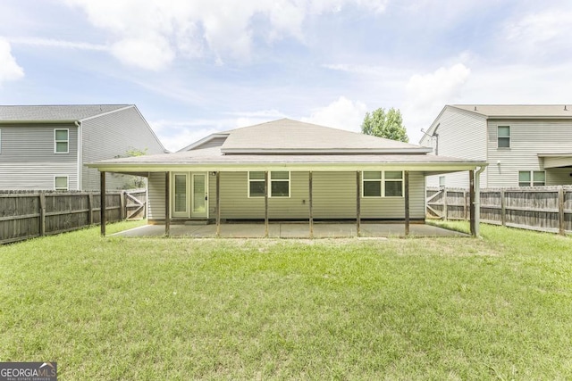 208 Flowing Meadows Dr, Kathleen, GA 31047 - rear view of house with a patio area and a fenced backyard