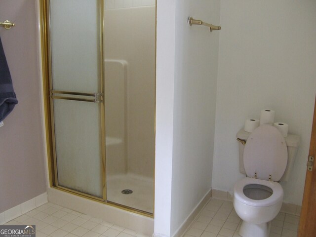 1455 River Cove Rd, Social Circle, GA 30025 - bathroom with a shower stall and tile patterned flooring