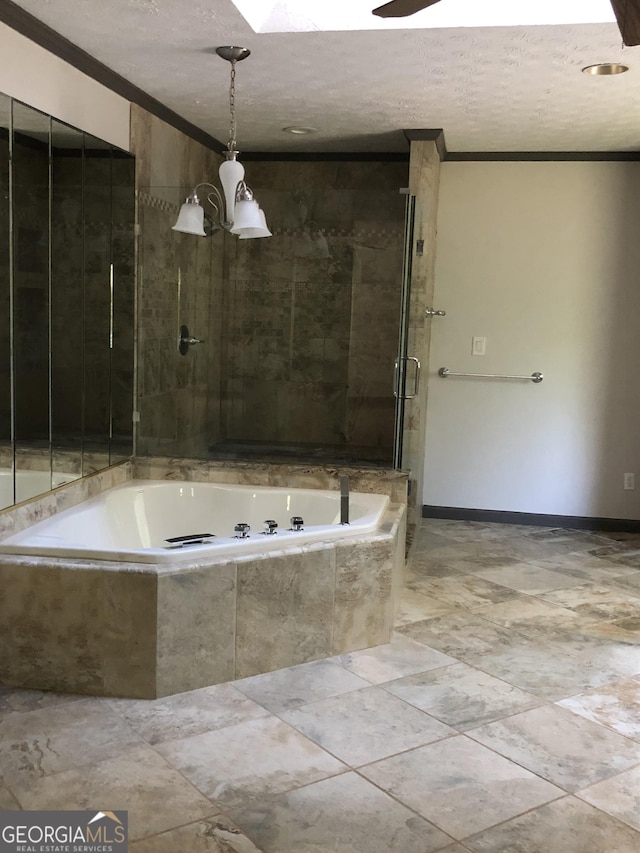 1455 River Cove Rd, Social Circle, GA 30025 - bathroom featuring crown molding, a garden tub, a shower with door, and a chandelier