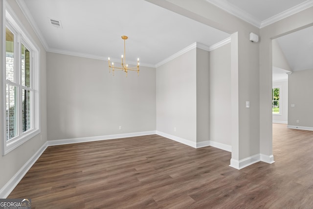 9 Honeysuckle Dr, Claxton, GA 30417 - unfurnished room with a chandelier, dark wood finished floors, and crown molding