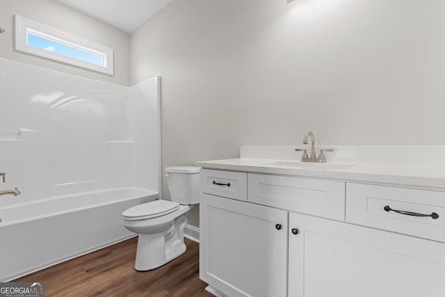 9 Honeysuckle Dr, Claxton, GA 30417 - full bathroom with vanity, shower / bathtub combination, and wood finished floors