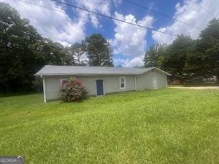 2669 H D Atha Rd, Monroe, GA 30655 - view of property exterior featuring a yard