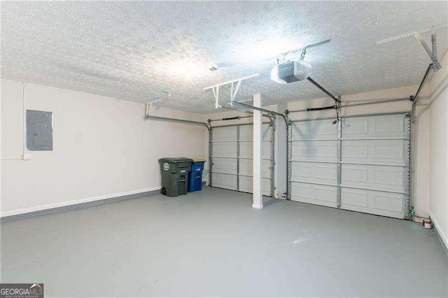 4271 Brighton Way NW, Kennesaw, GA 30144 - garage featuring electric panel and a garage door opener