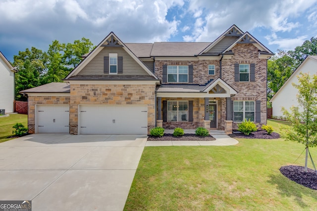 396 Brant Cir, Jefferson, GA 30549 - craftsman-style home featuring a front yard, driveway, and a porch